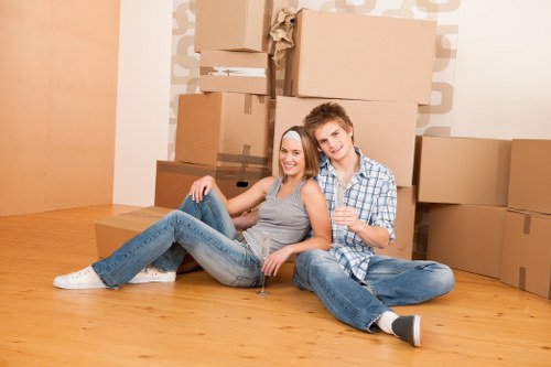 Local packing team preparing boxes for a move in Barnes