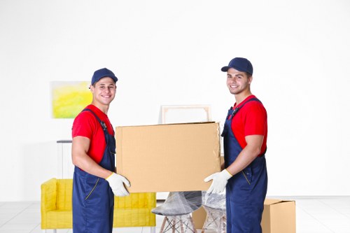 Removal Van Barnes team sorting recyclable materials at a property move