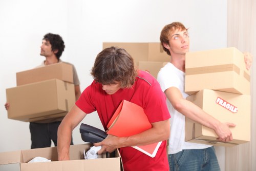 Removal crew loading household items for a Barnes property move