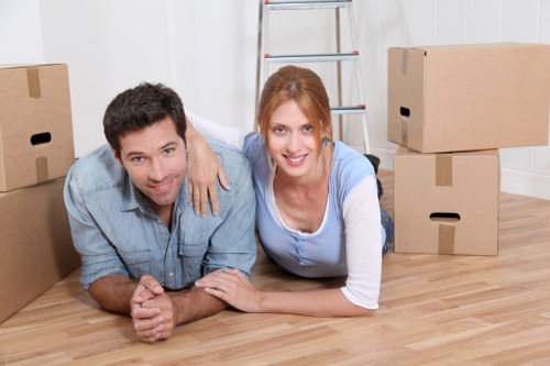 Packed boxes and furniture prepared for storage in Barnes