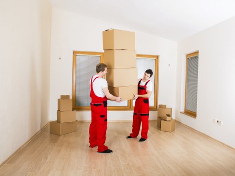 Careful loading of household furniture for a local Barnes relocation