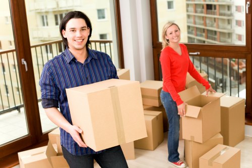 Packing and loading furniture for an apartment move in Barnes
