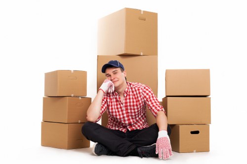 Professional movers handling office furniture in Barnes